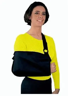 A woman wearing a bright yellow top smiles while holding her arm in a black sling. The background is plain white.