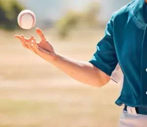 Man throwing baseball. 