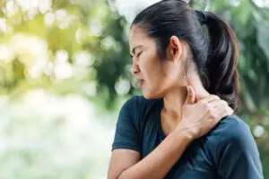 Woman with a popping shoulder. 