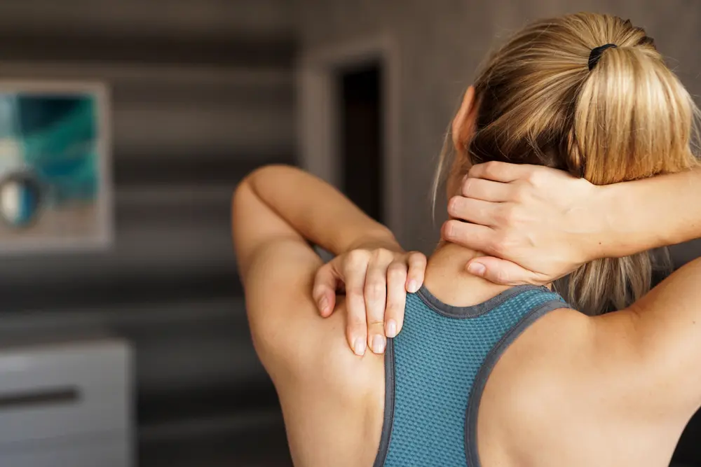 Woman with neck and shoulder pain.