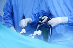 Doctors performing minimally invasive surgery. 